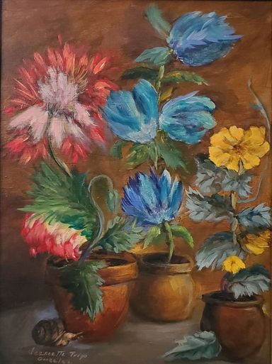 Pots of colorful flowers on a table